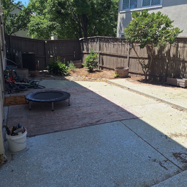 Stone-clad waterfall feature