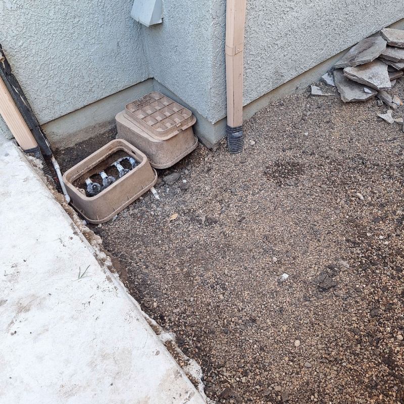 Newly installed brick paver patio with outdoor furniture and a cozy fire pit